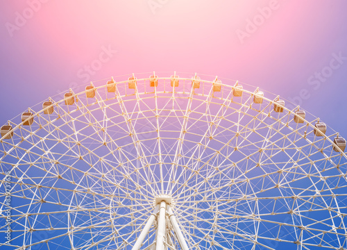 white big ferris wheel on background a clear blue sky in Park in Tashkent photo