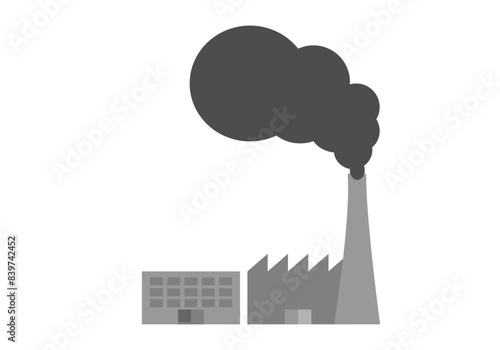 Fábrica gris emitiendo polución por la chimenea. 