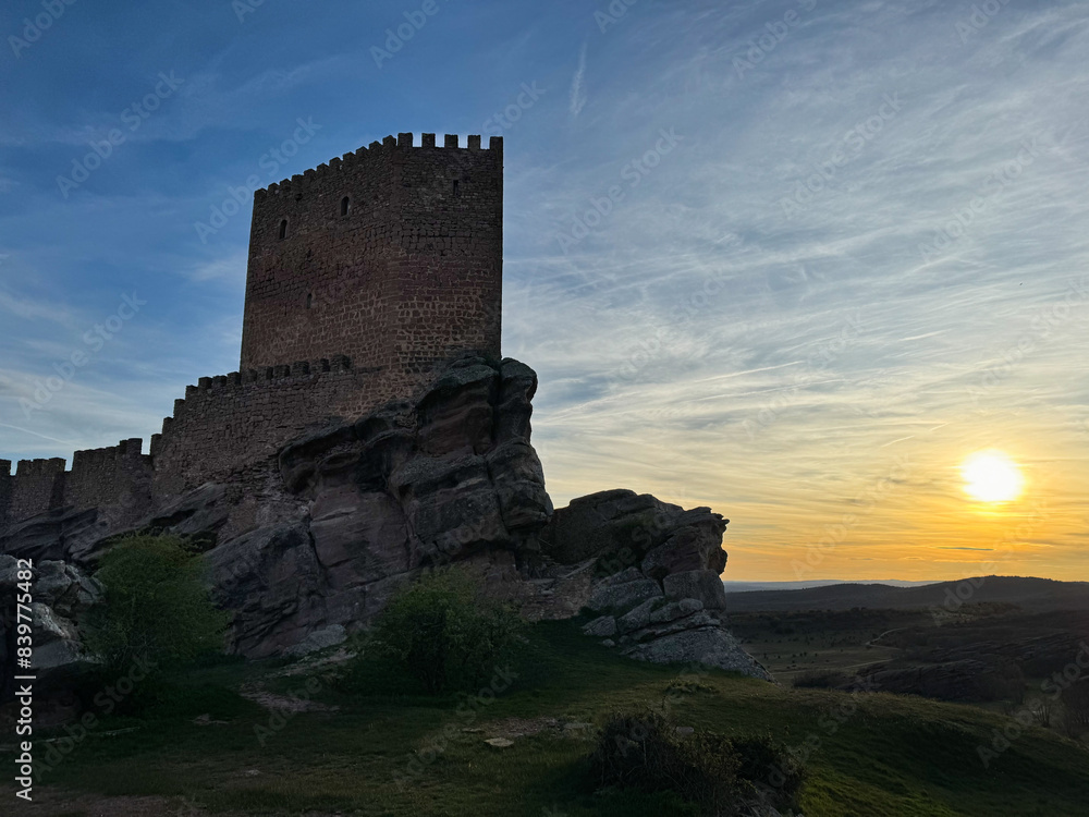 Castillo de Zafra in Guadlajara, Spain, Medieval castle in the rock, nice view with the sun Castillo de Zafra in Guadlajara, Spain, Medieval castle in the rock, nice view with the sun