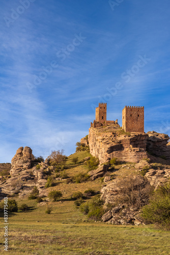Castillo de Zafra in Guadlajara, Spain, Medieval castle in the rock, nice view with the sun