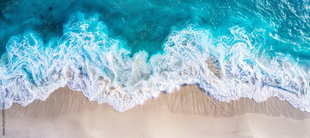 Photo of Aerial view from above on white sand beach with turquoise water and waves, panorama banner. Photo of Aerial view from above on white sand beach with turquoise water and waves, panorama banner.