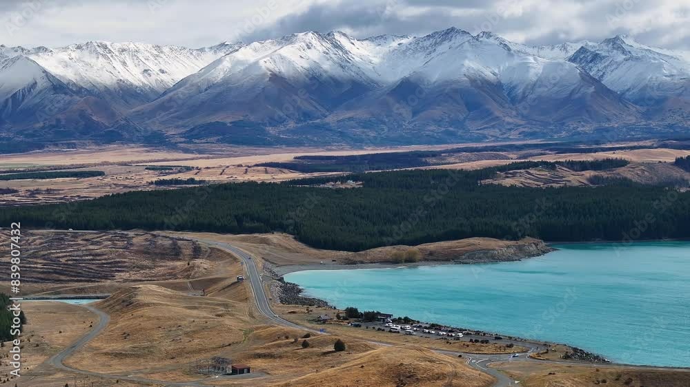 View point on Lake Pukaki, tourist attraction surrounded by mountain peaks in New Zealand. View point on Lake Pukaki, tourist attraction surrounded by mountain peaks in New Zealand.