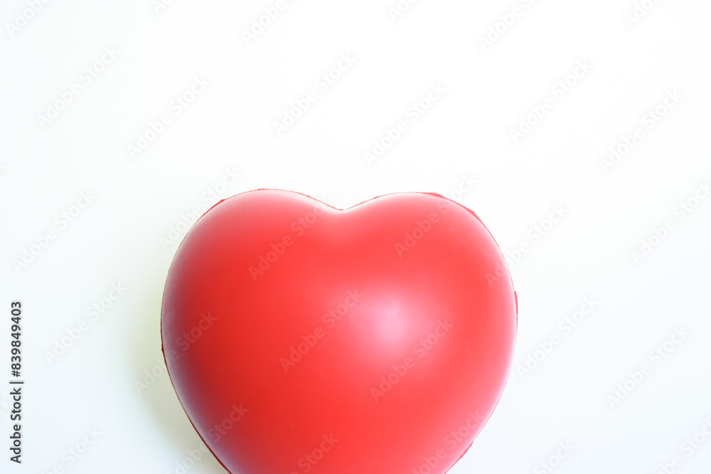 single red stress ball isolated on white background, heart shape toy single red stress ball isolated on white background, heart shape toy