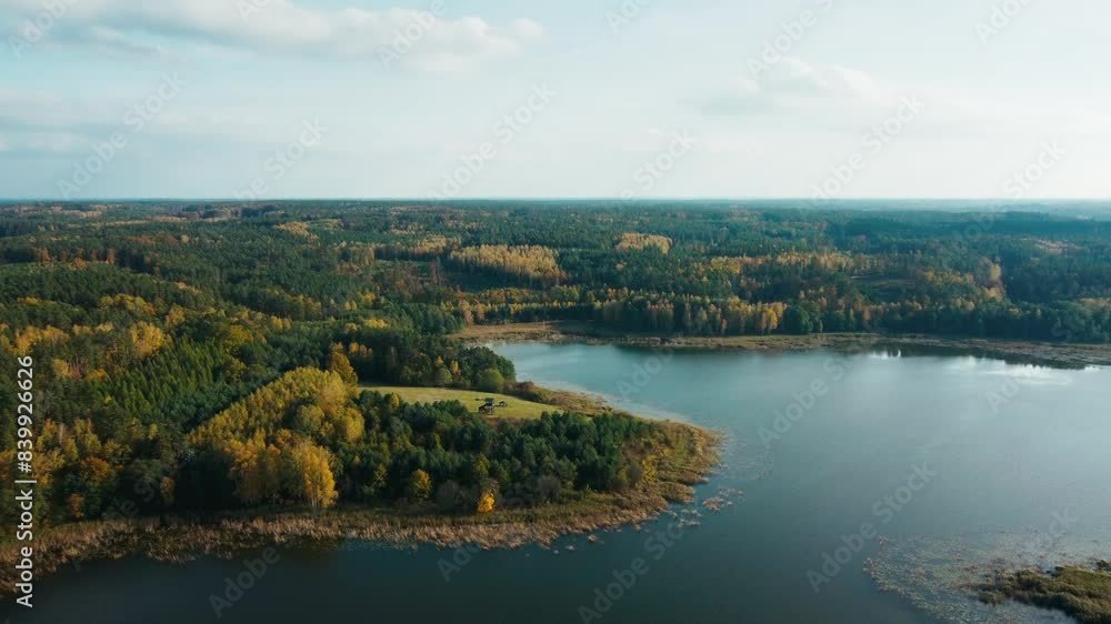 Peaceful Lake and Vibrant Autumn Forest from Above - Polish nature landscape Peaceful Lake and Vibrant Autumn Forest from Above - Polish nature landscape