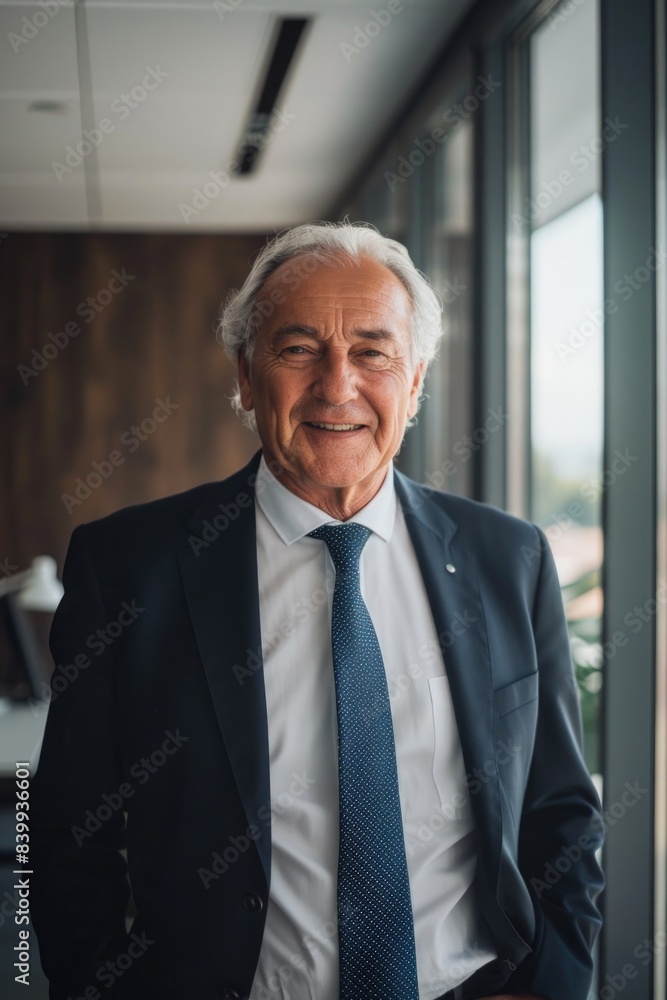 Man in Suit Standing by Window Man in Suit Standing by Window