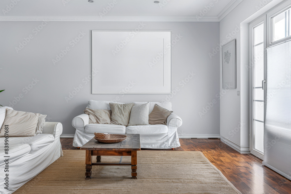 Fototapeta premium Bright minimalist living room in a luxury home with stylish minimal furniture and natural lighting. Home decor minimalist composition in neutral tonality.