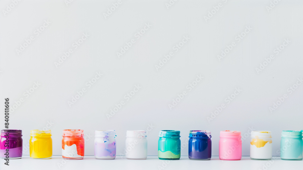 Bright jars of gouache paint in a variety of colors, arranged neatly on a white surface, providing a visually striking image for artistic inspiration.
Bright jars of gouache paint in a variety of colors, arranged neatly on a white surface, providing a visually striking image for artistic inspiration.