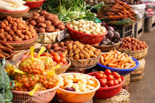 Fresh vegetables on display in a traditional market