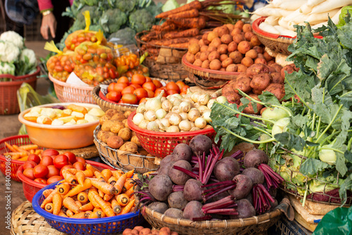 Fresh vegetables on display in a traditional market