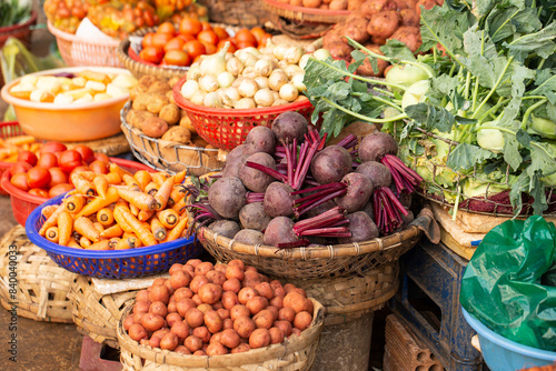 Fresh vegetables on display in a traditional market
