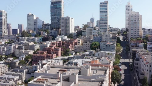 Aerial rising and panning shot of downtown San Francisco, California from Lombard Street on Russian Hill. 4K