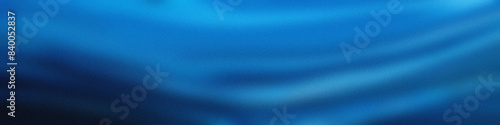 Abstract grainy gradient background, blue