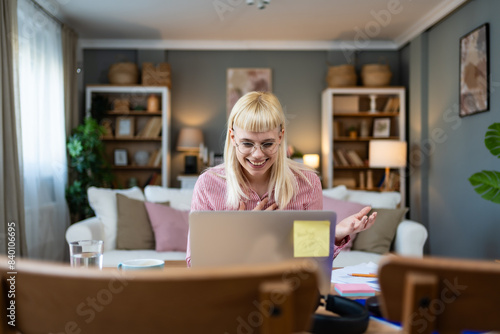 Online presentation and business education. Winner career mindset freelance finance and economy expert woman working at home, having video call with mentor on laptop. Using computer, modern technology