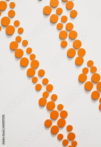 a number of orange circles on a white surface