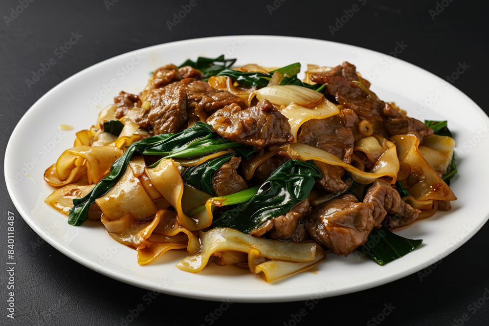 Savory beef stir fry with noodles and greens Savory beef stir fry with noodles and greens