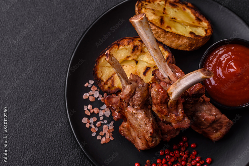 Delicious juicy meat on the bone or rack of lamb or grilled veal Delicious juicy meat on the bone or rack of lamb or grilled veal