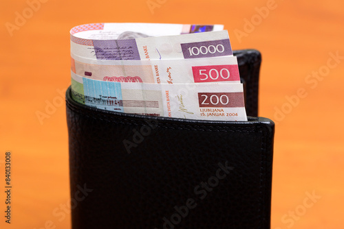 Slovenian tolar in the black wallet photo