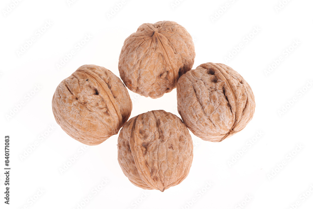 Walnuts are isolated on a white background,
