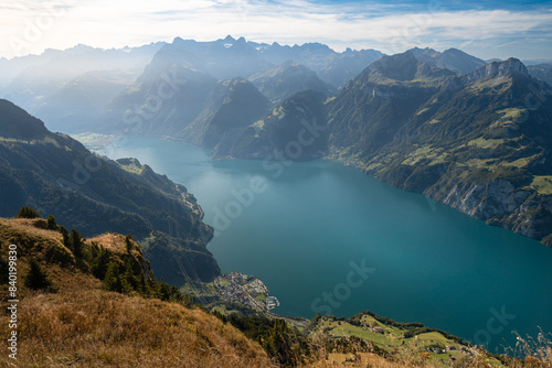 Obraz na płótnie Lake in a valley seen from Fronalpstock summit in Switzerland. Swiss Alps iconic view w salonie