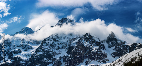 Fototapeta Naklejka Na Ścianę i Meble -  Mountain peaks near Morskie Oko or Sea Eye Lake in Poland at Winter. Tatras range