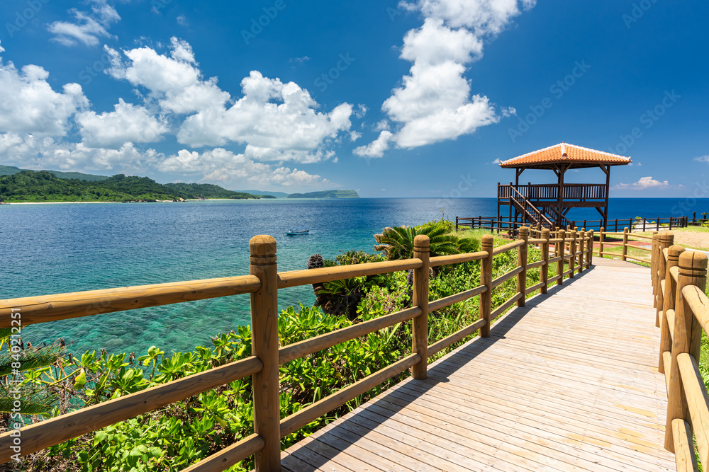 Wooden path to the Unarizaki Observatory Deck. Beautiful view on Iriomote island, Okinawa. Wooden path to the Unarizaki Observatory Deck. Beautiful view on Iriomote island, Okinawa.