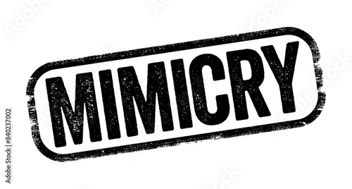 Mimicry is an evolved resemblance between an organism and another object, text stamp concept background