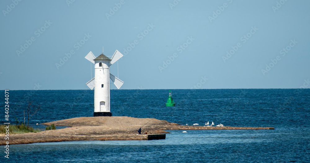 Φωτογραφία Panoramic image of an old lighthouse in Swinoujscie, a port in Poland on the Baltic Sea