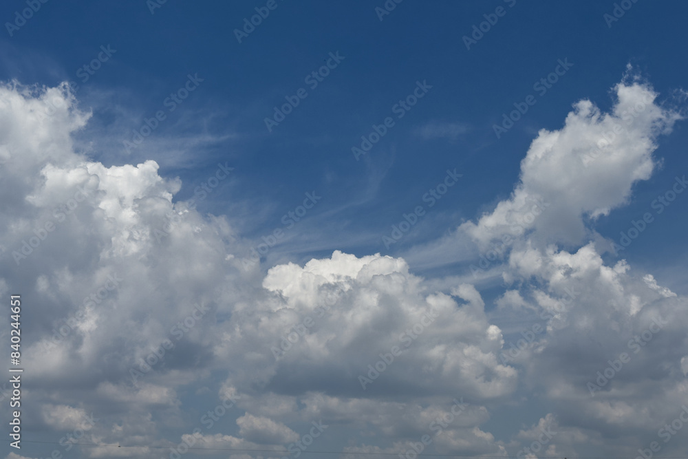 Beautiful white clouds in the blue sky, a drawing of splendid nature Beautiful white clouds in the blue sky, a drawing of splendid nature