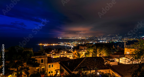 Beautiful view of night town of Italy with colorful golden lights  night landscape on city of Europe