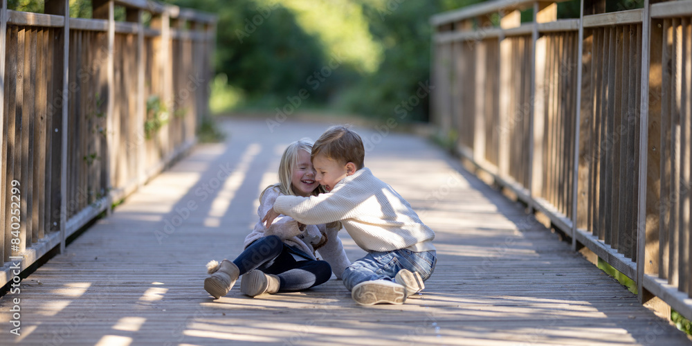 Lovely kids playing and having fun in the park