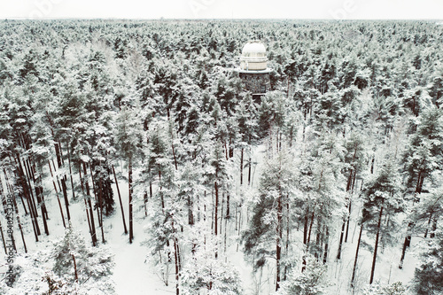 Old observatory tower in the Glen park, in fir forest. Tallinn, Estonia. photo