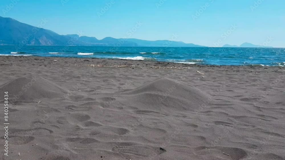 sand beach in the background of the mountains
sand beach in the background of the mountains