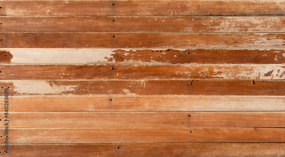 Naklejka premium Faded orange old wooden planks texture background