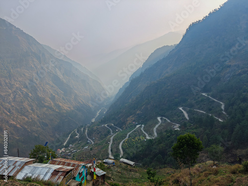 The curved dangerous Pasang Lhamu Highway at the administrative seat of Rasuwa District photo