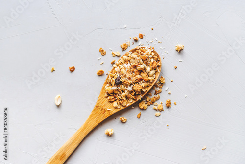 Muesli or granola on gray background. Healthy food concept. photo