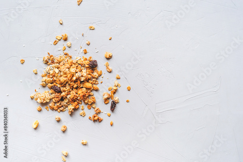 Muesli or granola on gray background. Healthy food concept. photo