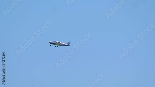 Small Airplane Gliding High in the Clear Blue Sky in 4k slow motion 60fps