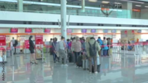 Dazzling Airport Bokeh with Illuminated Passengers and Lively Atmosphere in a Bustling Terminal in 4k
