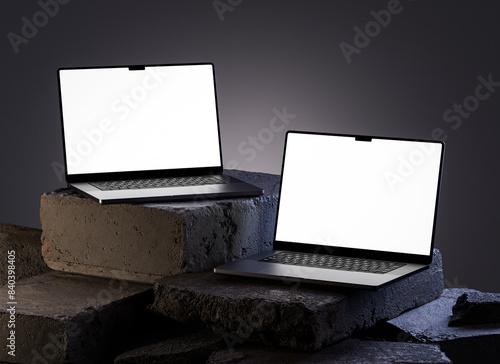 Two modern laptops screen mockup floating on a dark scene in realistic 3D rendering. Notebook display template for UI UX, webs and branding design presentation