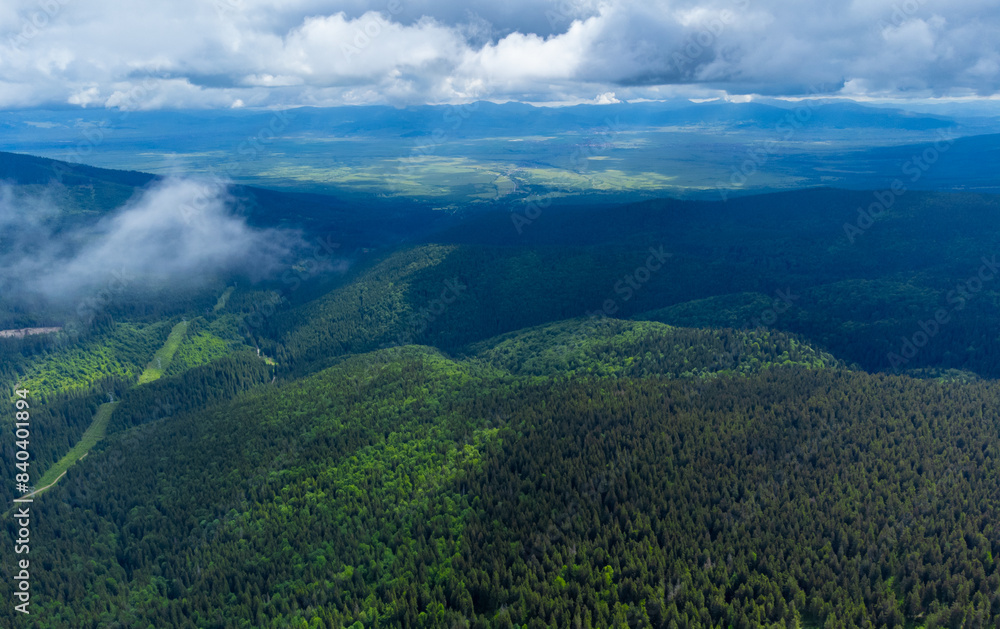Aerial landscape of the mountains in the Praid area, Harghita county on a cloudy day