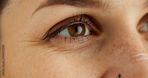 Fotografie Eyes, thinking and future with person closeup in studio for hope, optimism or contemplation