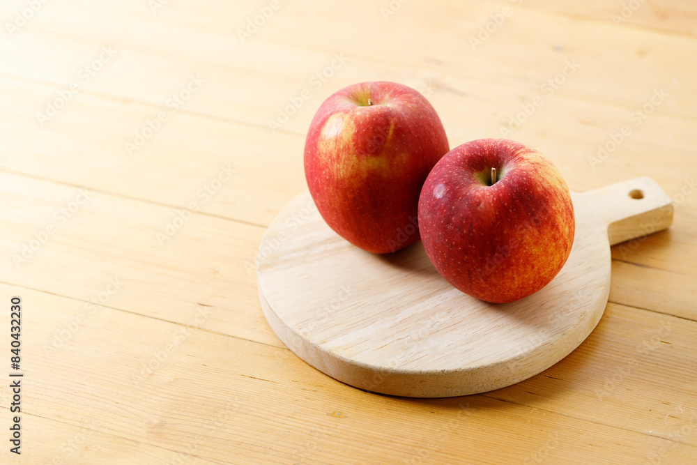 Ripe organic red apple on wooden table background. Ripe organic red apple on wooden table background.