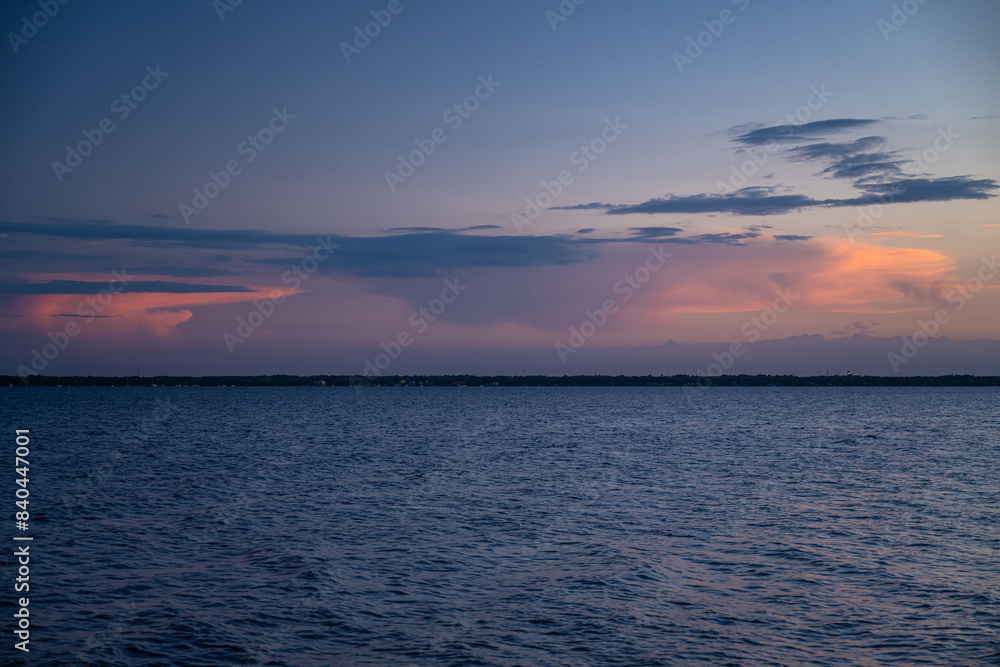 Obraz premium sunset on the river