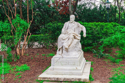 Statue of Austrian landscape painter Emil Jakob Schindler in Stadtpark, Vienna, Austria photo