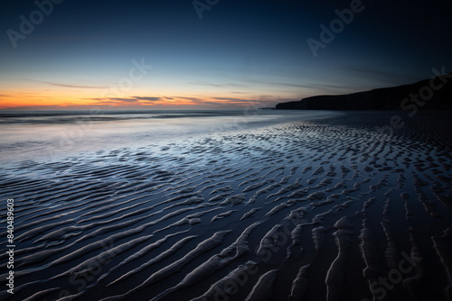 Sunset and Sand Ripples at Watergate Bay, Cornwall, England, United Kingdom photo