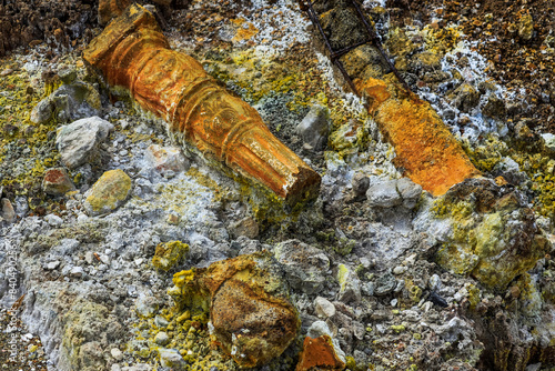 Damage to pillars caused by fumarole steam and sulphur minerals at Bukit Kasih volcanic tourist world peacepark, Bukit Kasih, Minahasa, North Sulawesi, Indonesia photo