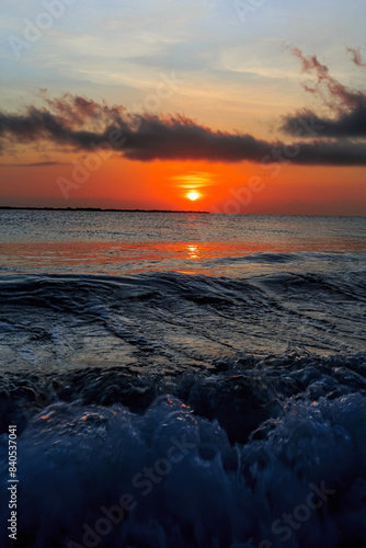 Colorful ocean sunrise on tropical beach