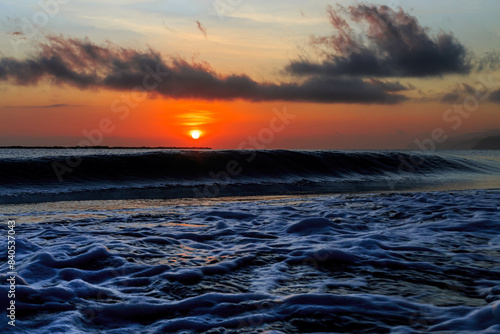 Colorful ocean sunrise on tropical beach