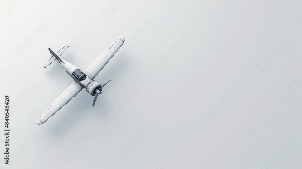 Top view of a single-engine airplane flying over a light grey background, showcasing its wings and propeller. Top view of a single-engine airplane flying over a light grey background, showcasing its wings and propeller.