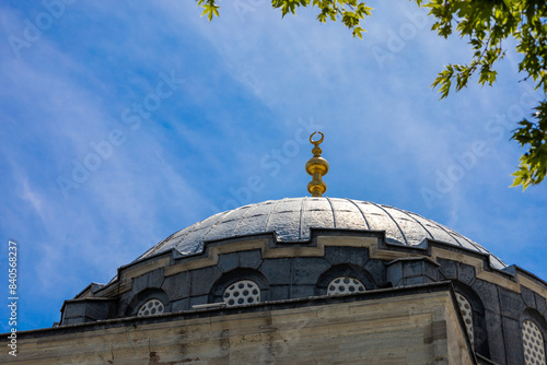 The Atik Valide Mosque, built by Mimar Sinan in 1583 by the wife of the Ottoman Sultan Selim II. Uskudar, Istanbul, Turkey on June 2, 2024. photo